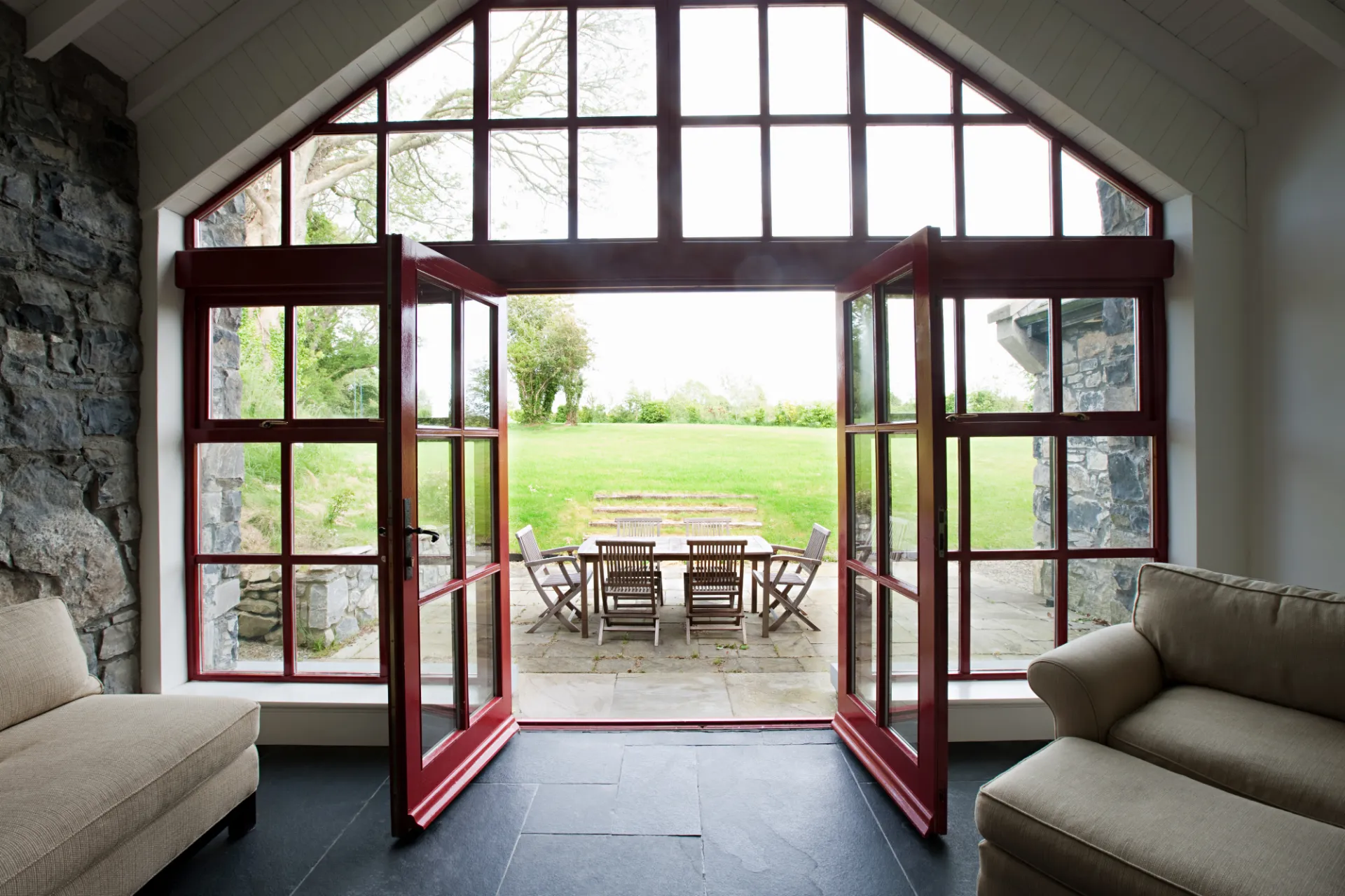 room-with-doors-open-onto-patio-2024-11-03-03-42-46-utc